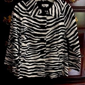 Never worn. Zebra print lined swing jacket
